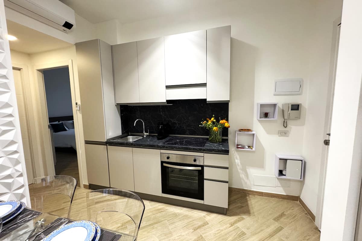 Soggiorno e cucina di Dimora Eleonora